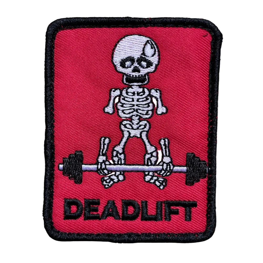 A red velcro patch featuring a white skull and crossbones symbol with the word 'DEADLIFT' below it.